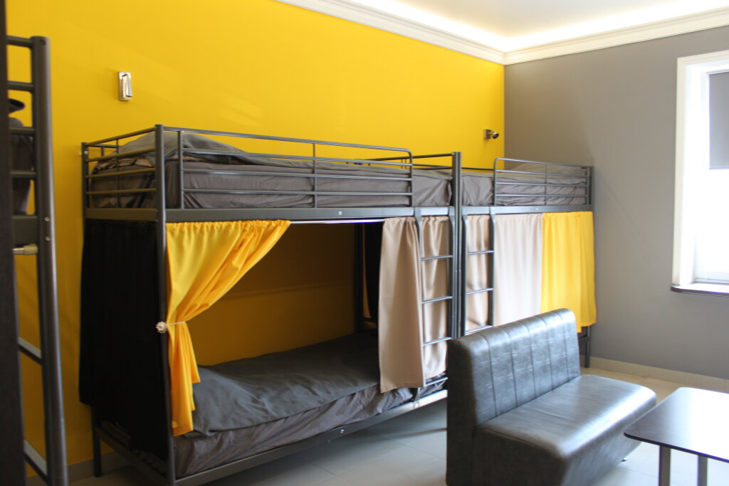 Кровать в общем номере Мини-Отель Rosemary Inn