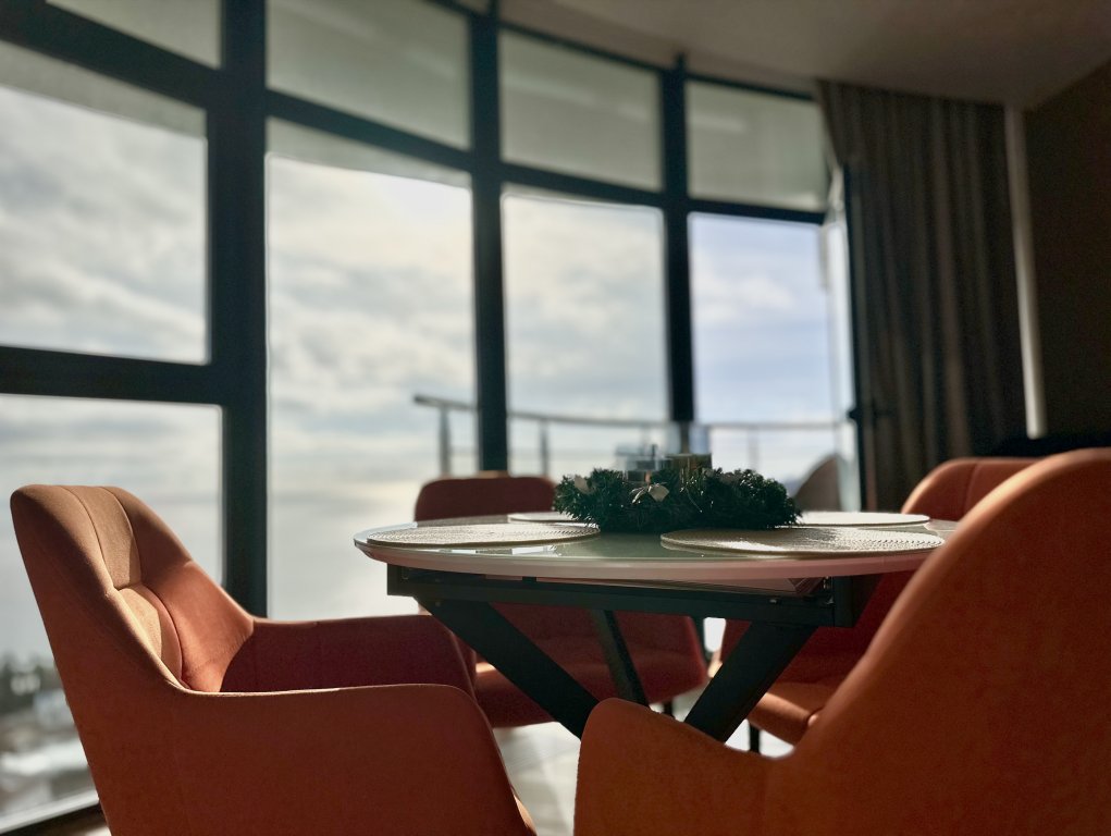Студия Orange с 2 комнатами с балконом и с красивым видом из окна Апарт-Отель Стиль Жизни