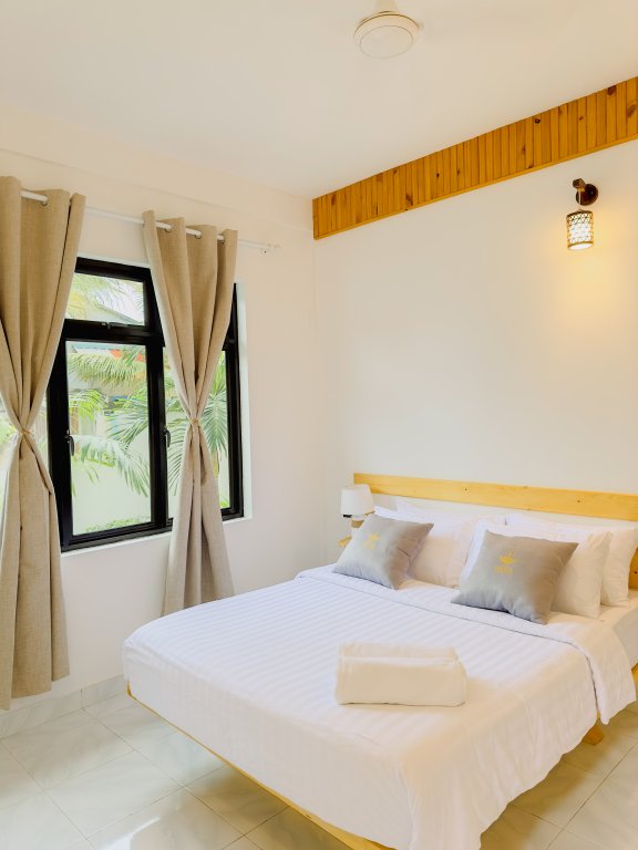 Deluxe double chambre avec balcon Dhoani Maldives Guesthouse