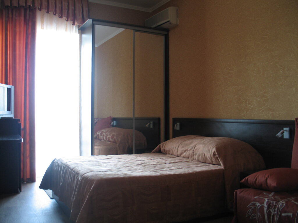 Standard quadruple chambre Chernoe More Hotel