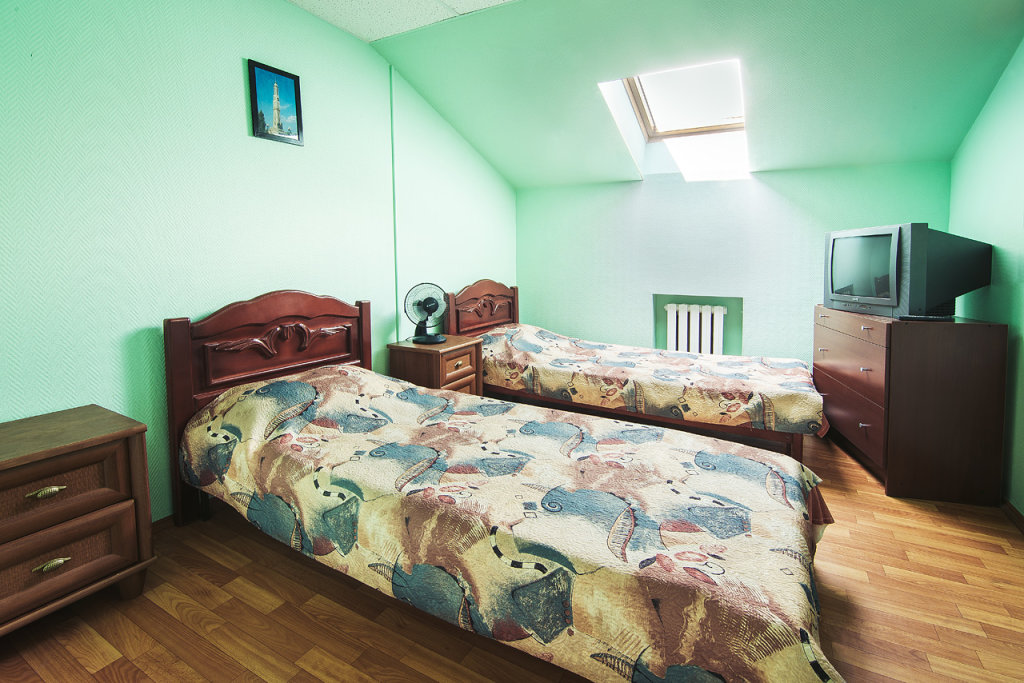 Кровать в общем номере Отель Ял на Оренбургском тракте