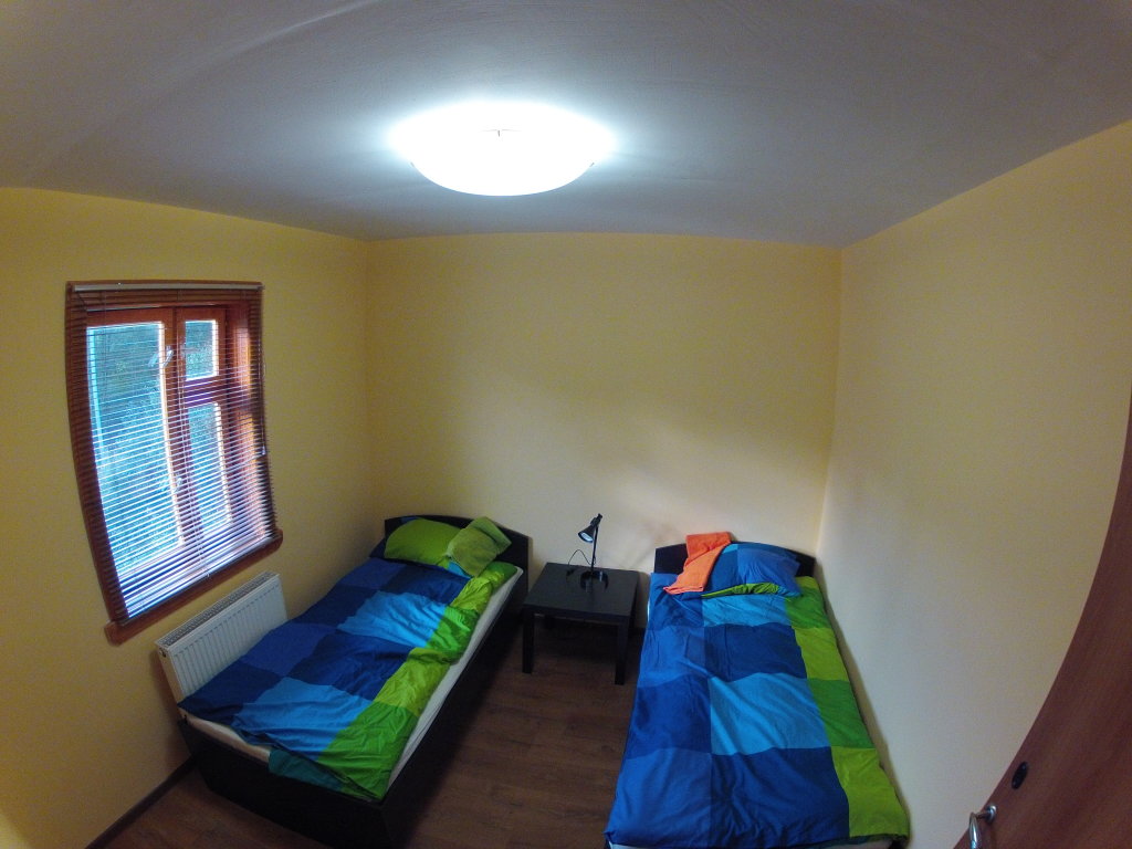 Кровать в общем номере Гостевой дом Серпейка