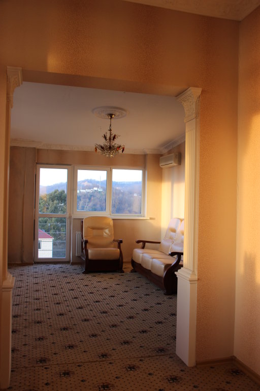 Suite 2 Schlafzimmer mit Balkon und mit Blick Guest House Guenos-Plaza