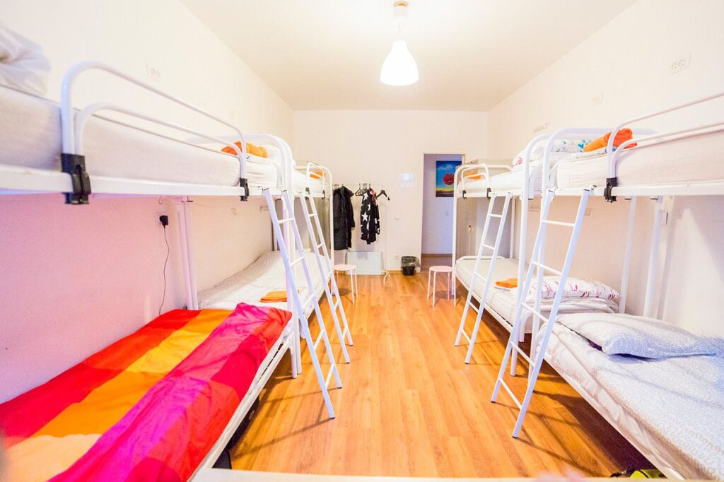 Кровать в общем номере Квартира на Васильевском