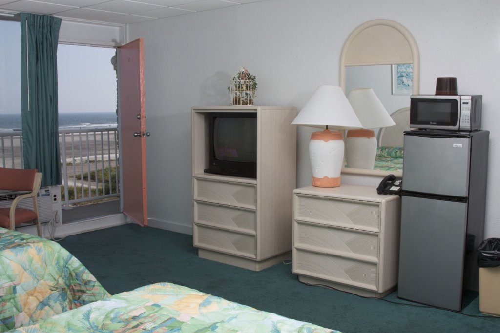 Deluxe Quadruple room with ocean view Olympic Island Beach Resort