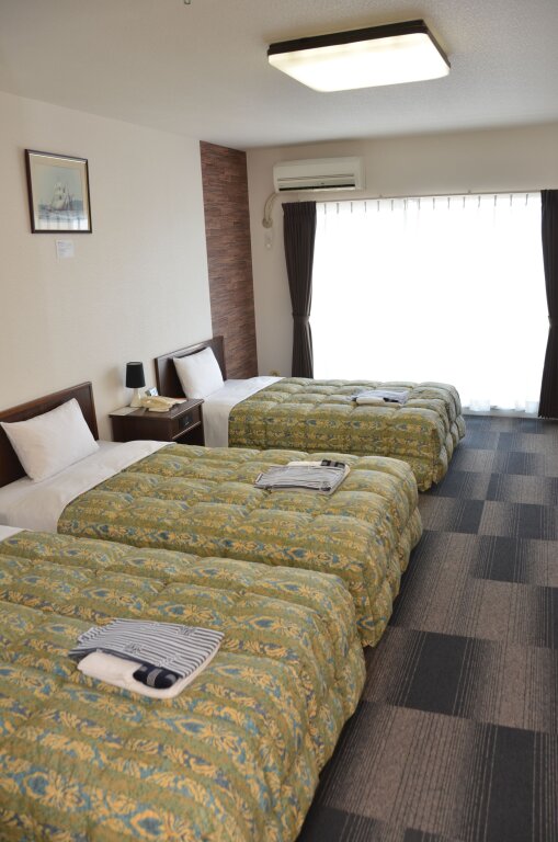 Трёхместный номер Standard Munakata Resort Hotel