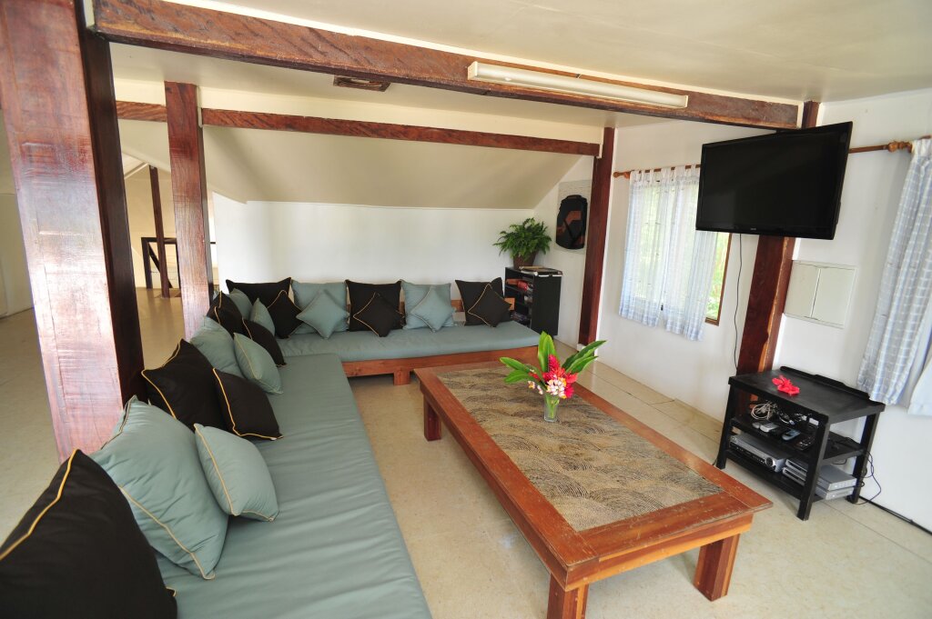 Кровать в общем номере Hideaway Island Resort