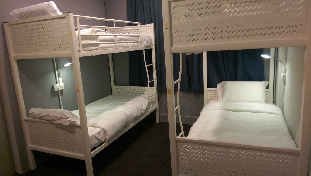 Кровать в общем номере Wassup Youth Hostel