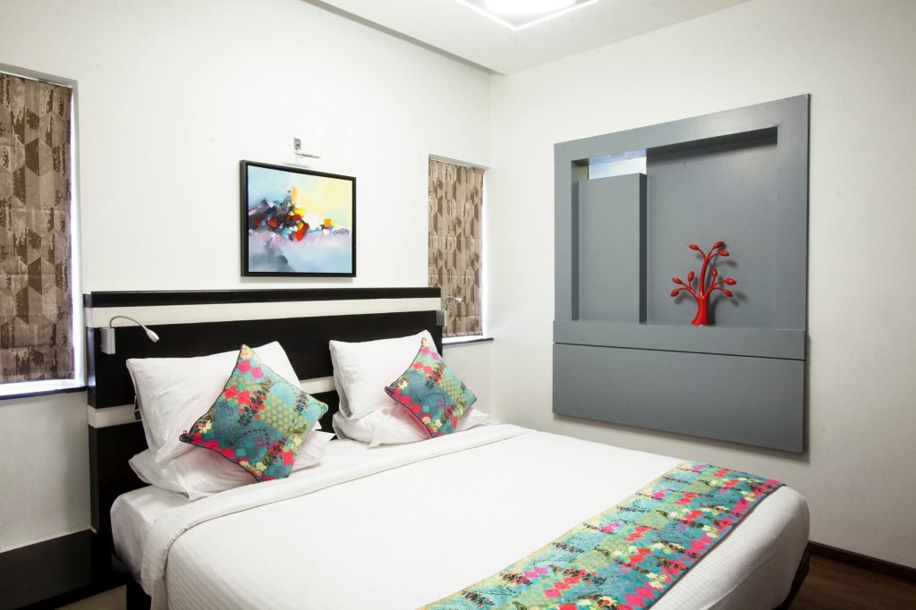 Comfort room Mango Hotels - Purple Brigade