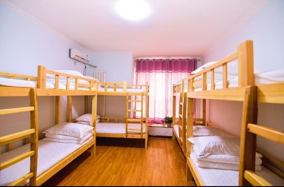 Кровать в общем номере (мужской номер) Luoyang As Home Youth Hostel