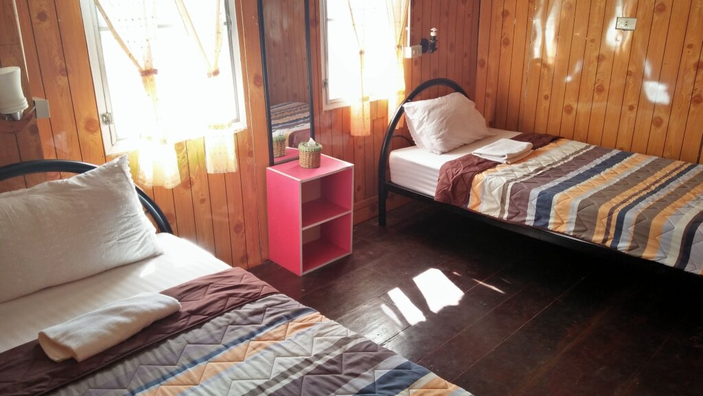 Кровать в общем номере Sangjun Guesthouse