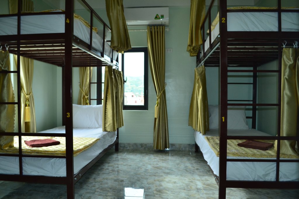 Кровать в общем номере Mango Hostel