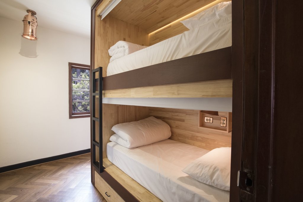 Cama en dormitorio compartido Hostal Casa Cubil