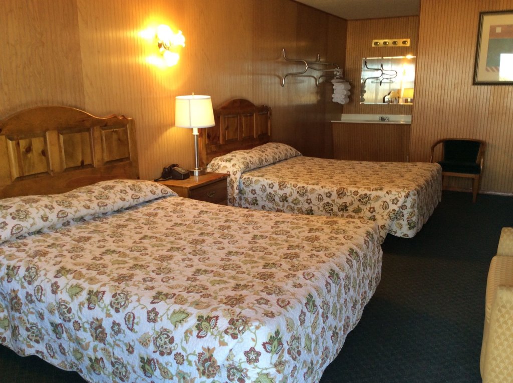 Habitación cuádruple Estándar Country Inn Motel