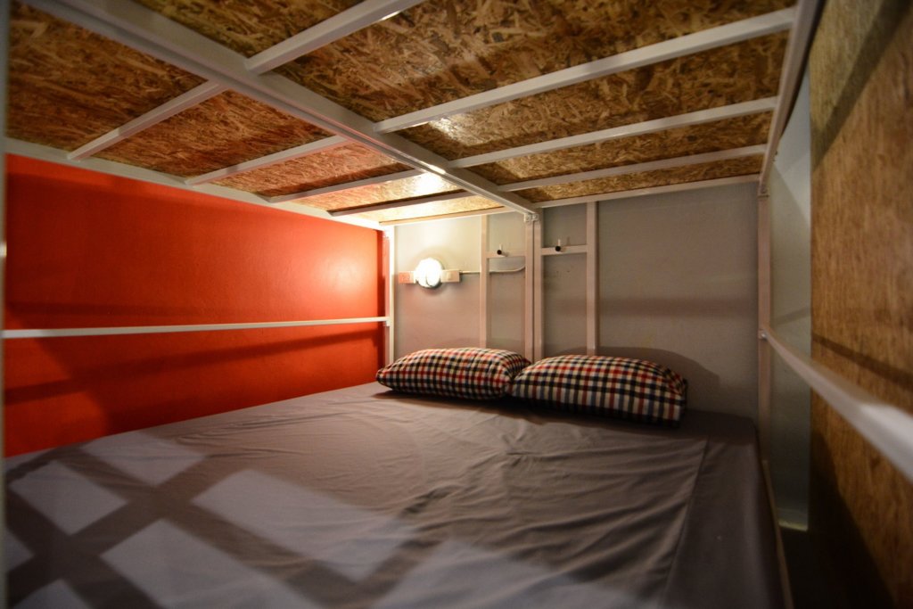 Кровать в общем номере Adventure Hostel