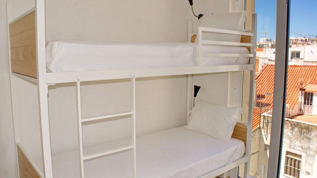 Кровать в общем номере Topcity Hostel & Suites