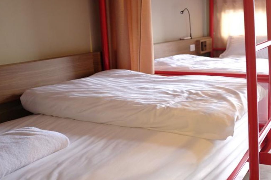 Кровать в общем номере D Hostel Bangkok