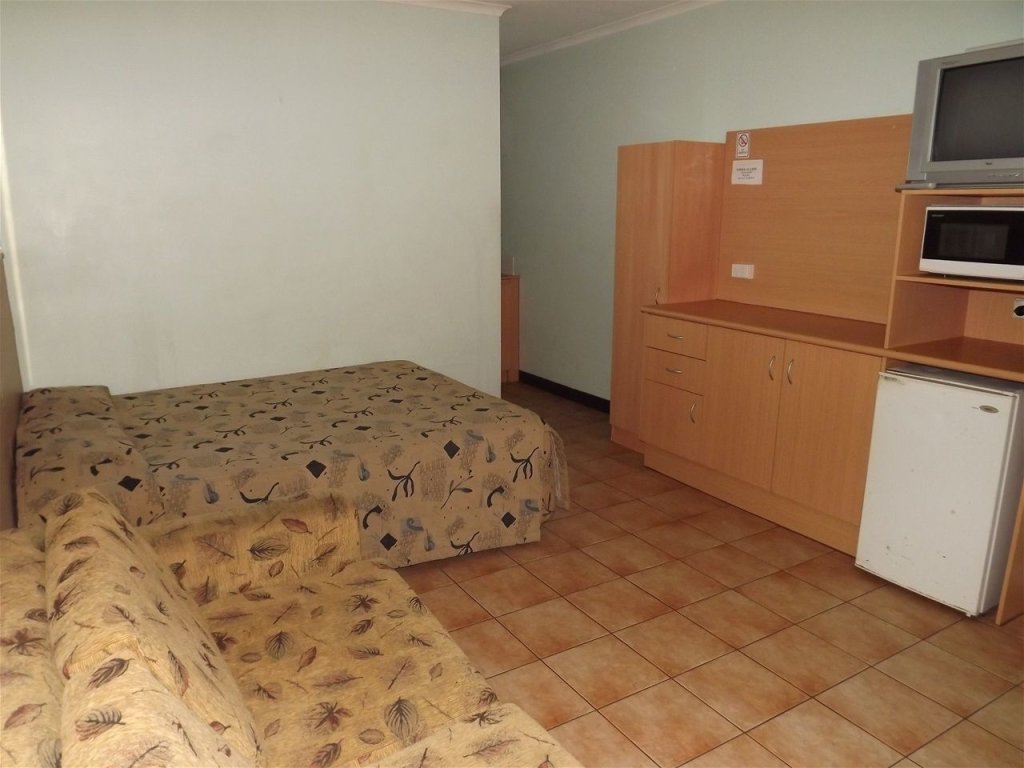 Кровать в общем номере (мужской номер) Palm Court Budget Motel Hostel/Backpackers