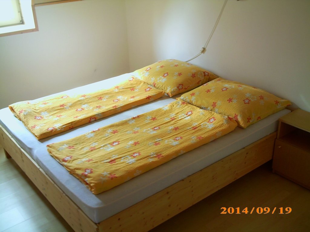 Cama en dormitorio compartido 3 habitaciones Balaton Apartman House 2