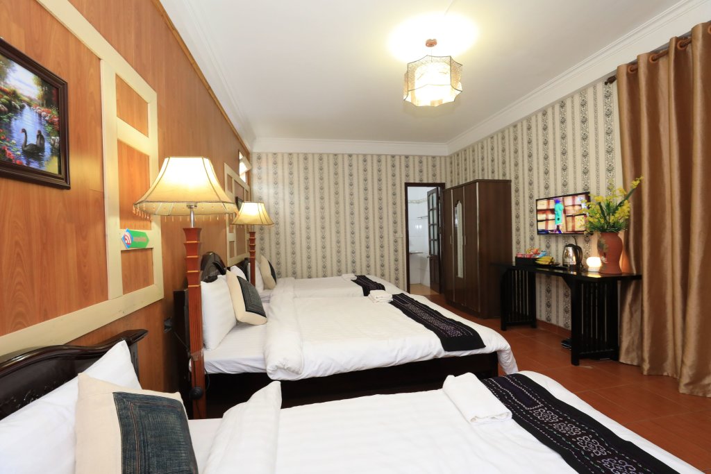 Кровать в общем номере Lasapa Hotel
