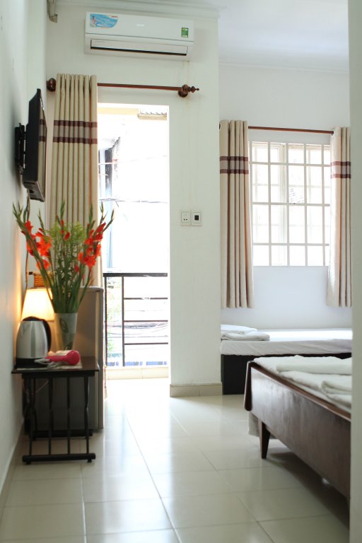 Suite familiare mansarda con balcone Saigon Smile Guesthouse