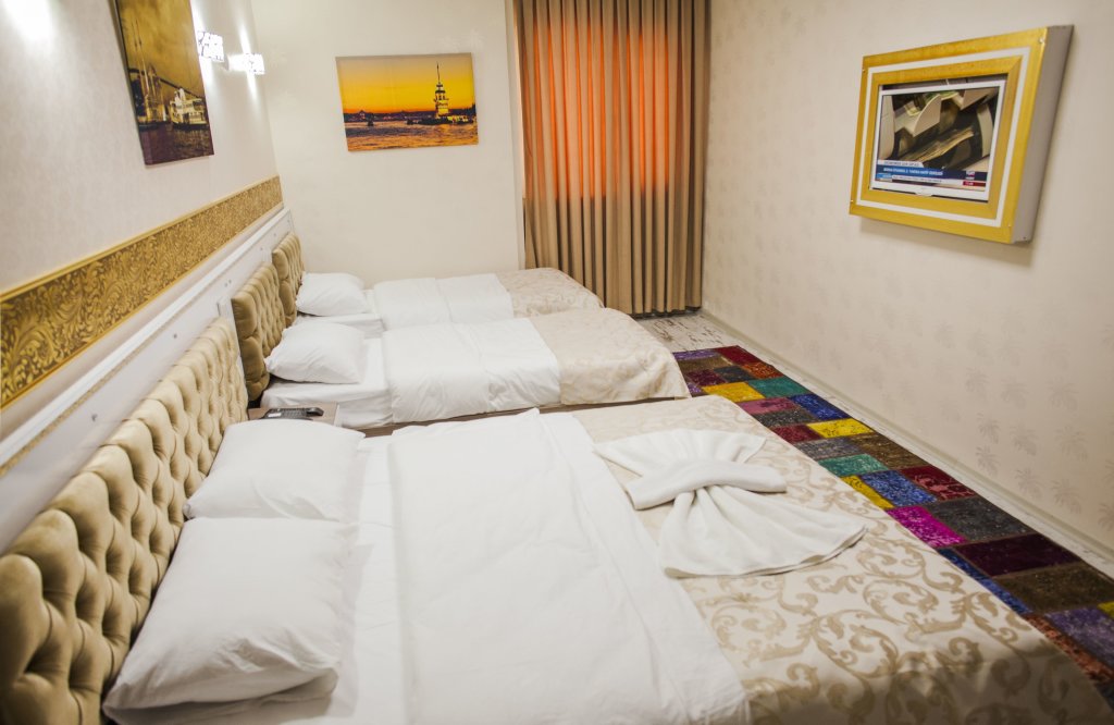 Standard Quadruple room White Palace Hotel