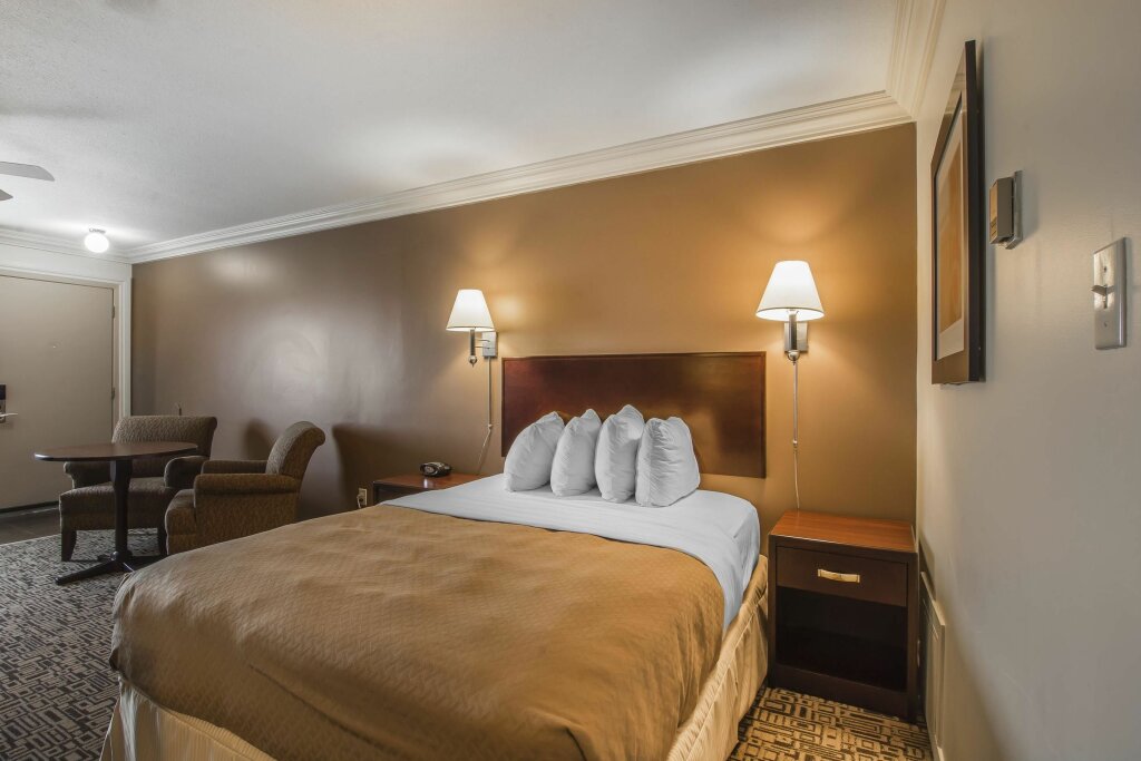 Standard quadruple chambre Quality Inn & Suites High Level