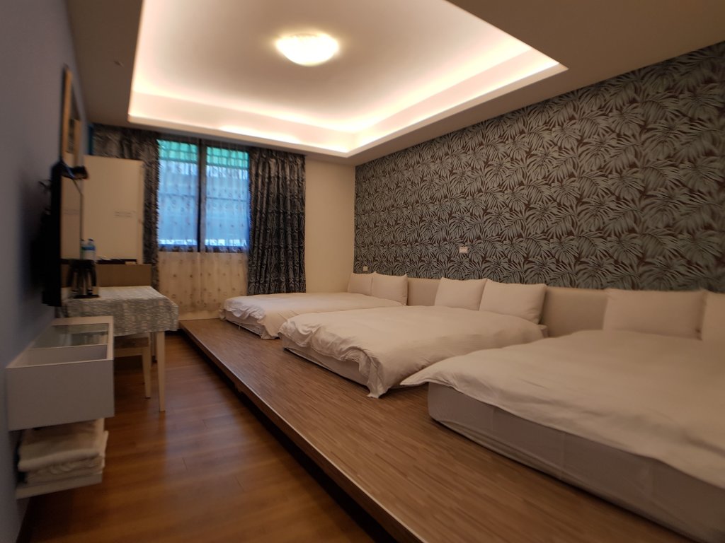 Кровать в общем номере DongYizhan