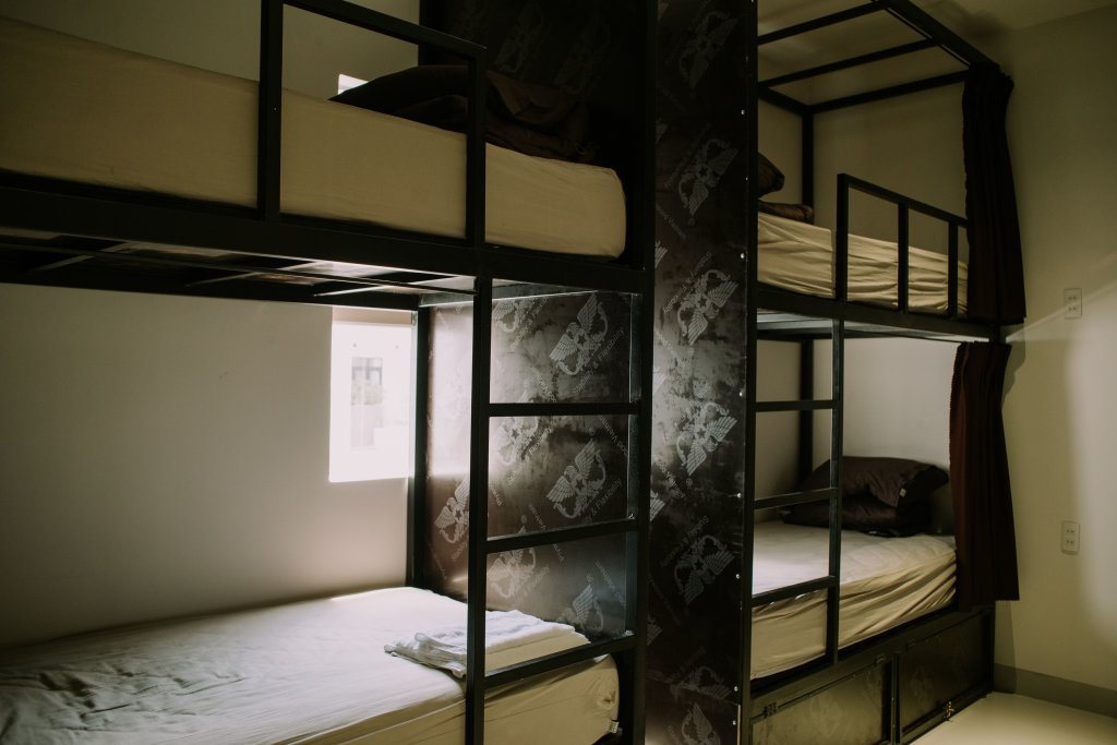 Кровать в общем номере Talofofo Hostel