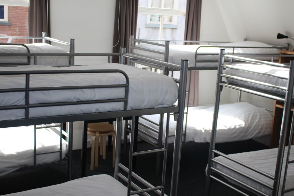 Кровать в общем номере Hostel Delft