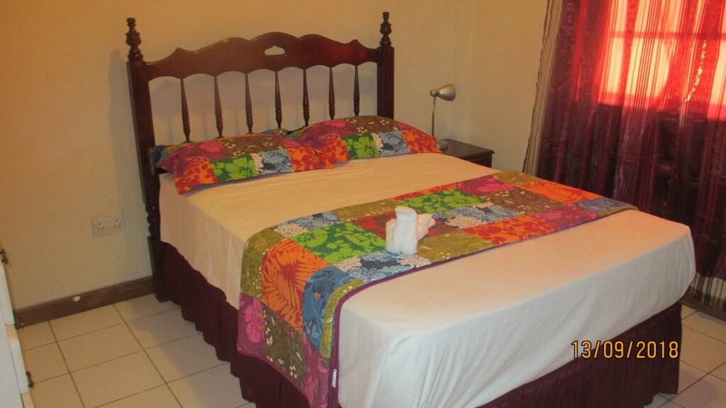 Standard Double room Tropical Breeze Vacation Home and Apartments