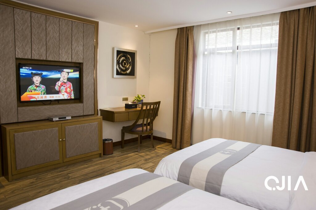 Confort chambre QJIA West Street Hotel