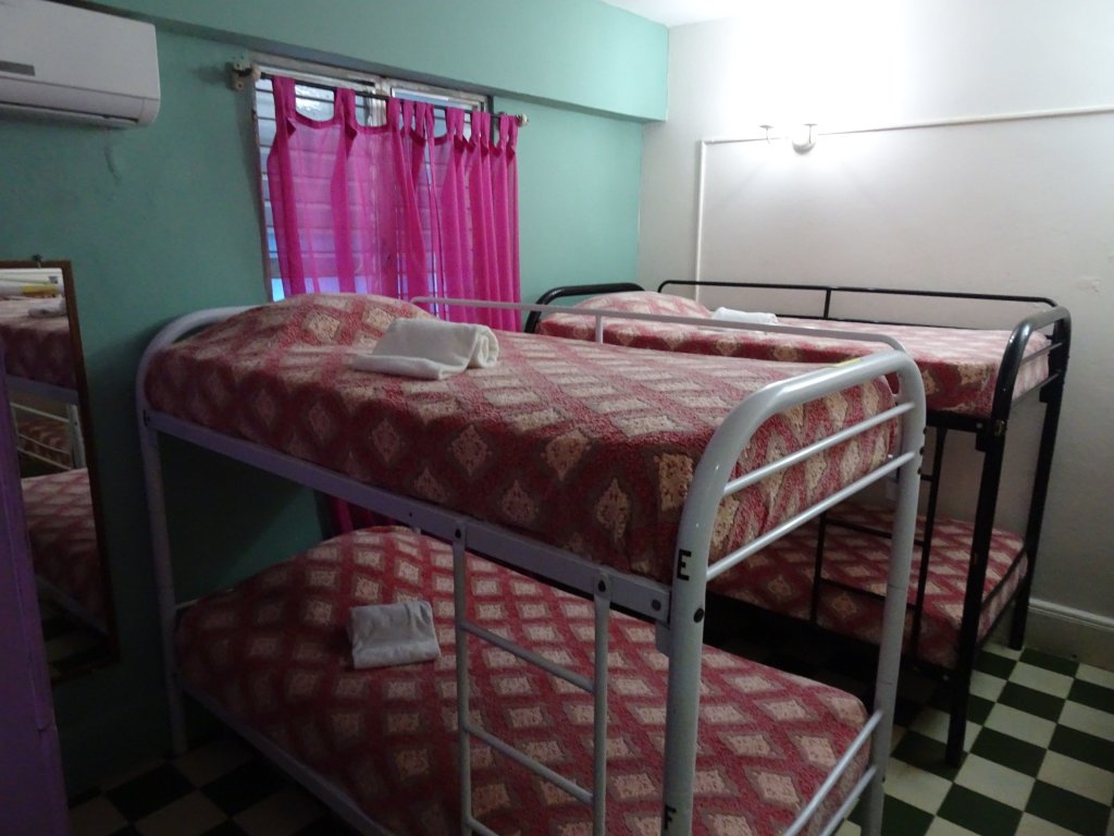 Кровать в общем номере Hostal Posada 1914