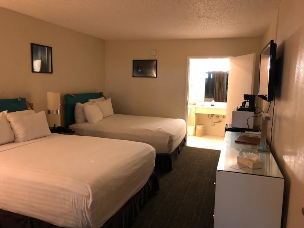 Deluxe Quadruple room Floridian Hotel