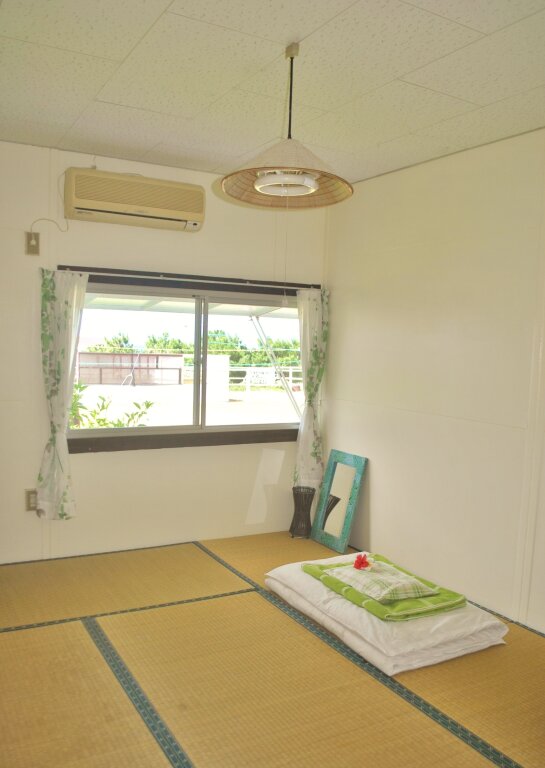 Cama en dormitorio compartido (dormitorio compartido masculino) Iriomotejima Monsoon - Hostel