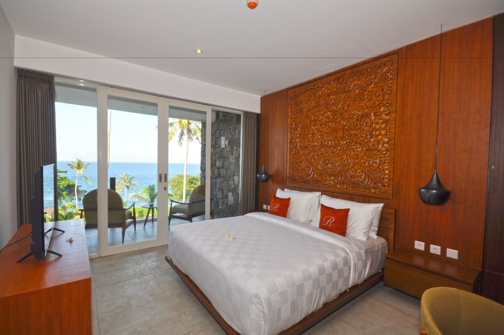Deluxe room with ocean view Rajavilla Lombok Resort - Seaside Serenity