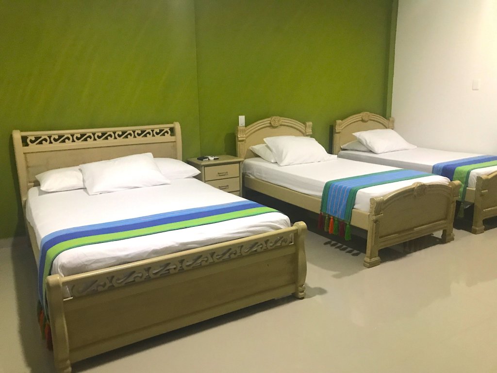 Standard Vierer Zimmer mit Gartenblick Hotel Emerawaa