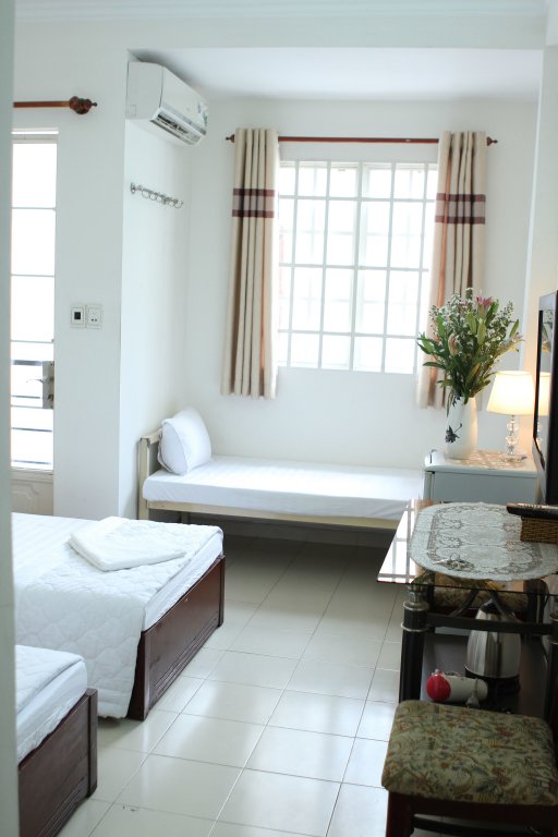 Suite Deluxe mansarda con balcone Saigon Smile Guesthouse