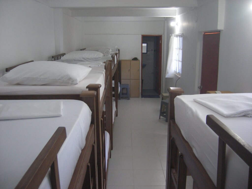 Кровать в общем номере Hostal Palohe Taganga