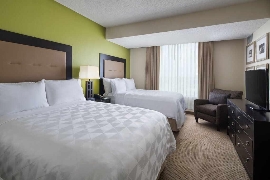 Suite 2 dormitorios Holiday Inn & Suites Across From Universal Orlando, an IHG Hotel