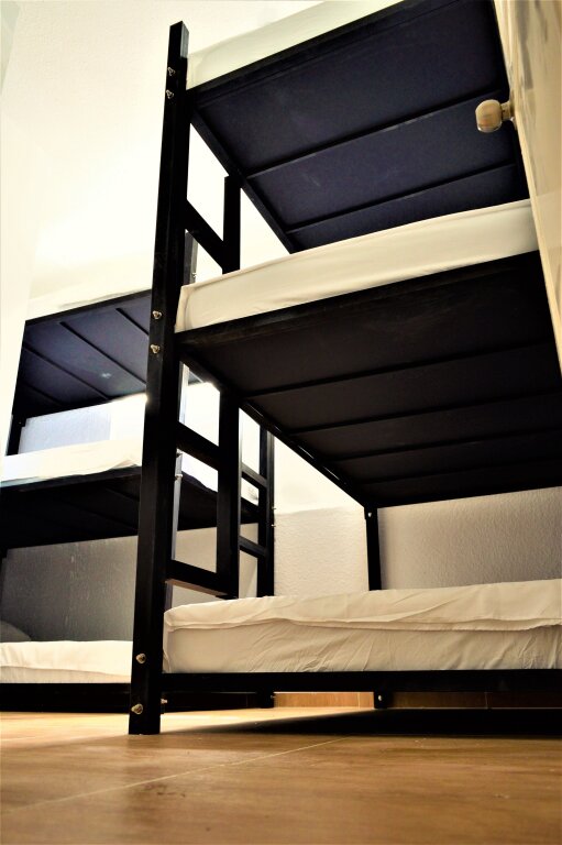 Кровать в общем номере Vigyan Hostel