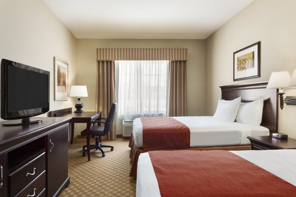 Четырёхместный номер Standard Country Inn & Suites by Radisson, Madison, AL