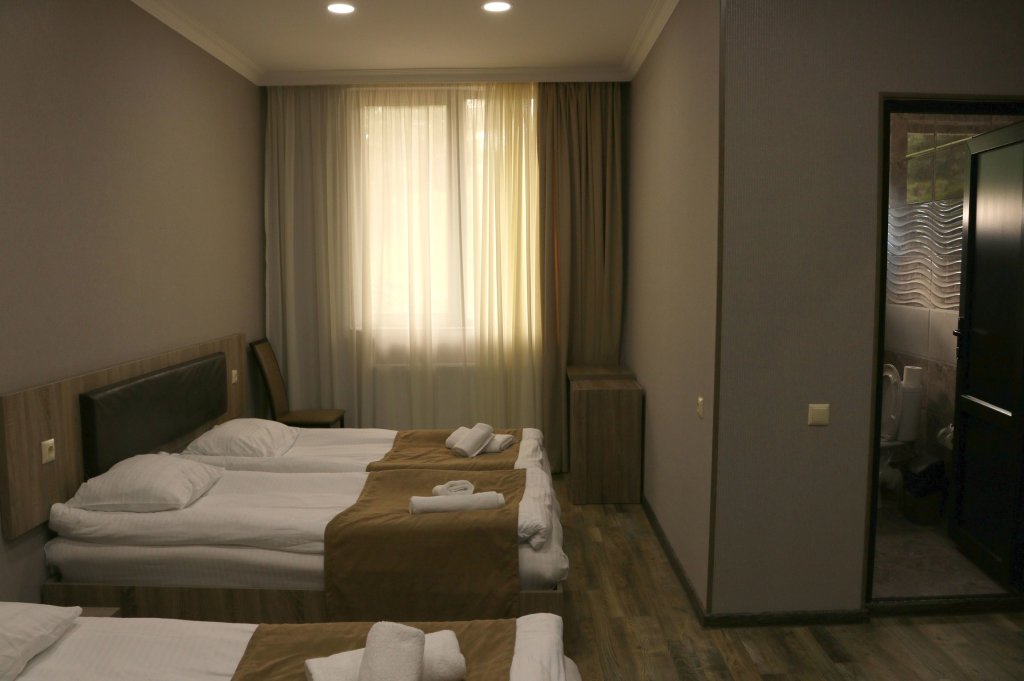 Standard Quadruple room Suntower Hotel