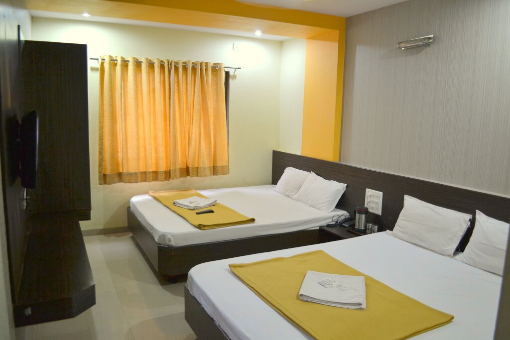 Deluxe Quadruple room Hotel Sai Kamal