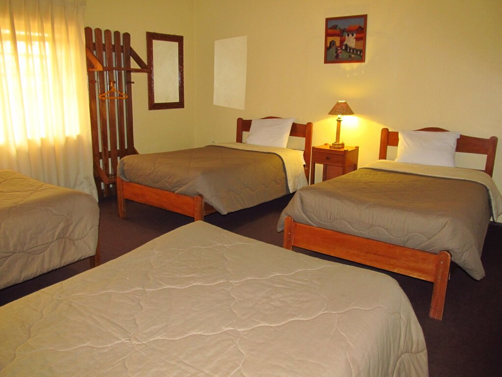 Кровать в общем номере Hospedaje Turistico Recoleta