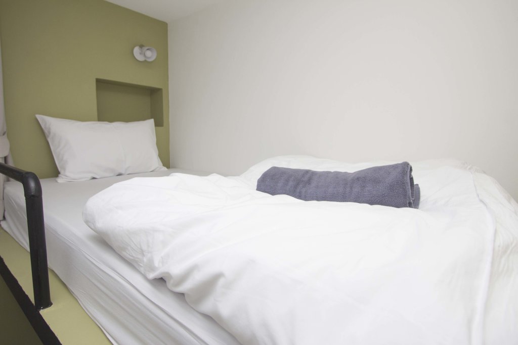 Кровать в общем номере Super OYO 426 All Day Hostel at Sukhmvit