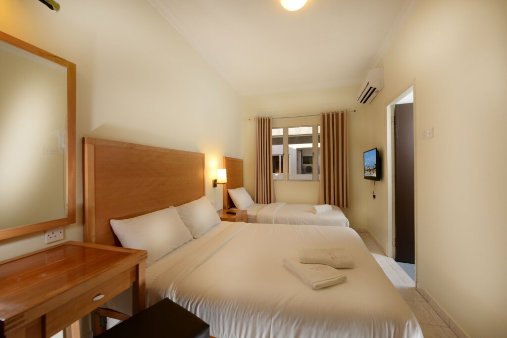 Трёхместный номер Standard Perdana Serviced Apartment & Resorts