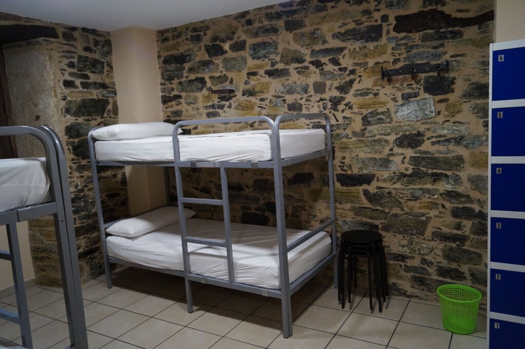 Кровать в общем номере Pension San Anton