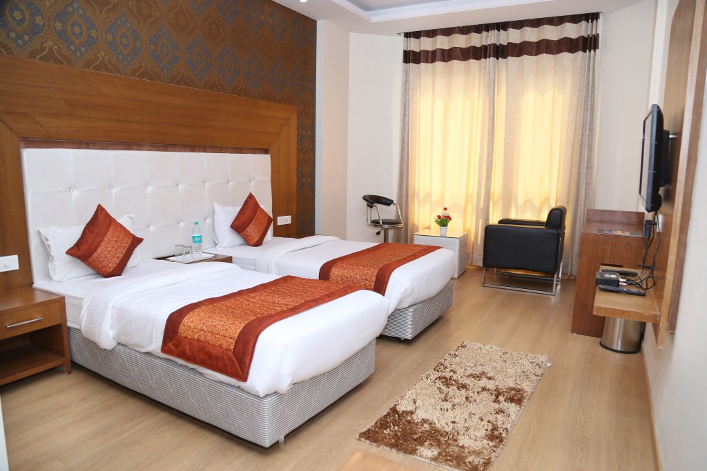 Deluxe Zimmer Qcent Gurgaon by Pacific Inn