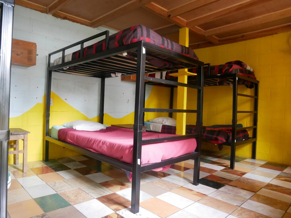 Кровать в общем номере Del Lago Hotel